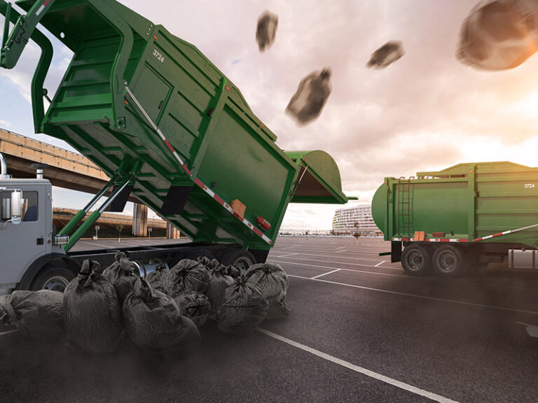 Garbage truck indignantly spits out a load from Capitol Hill