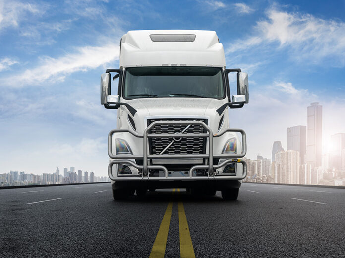 18-wheeler Drives Down the Middle of the Highway Refusing to Choose Sides in Political Divide